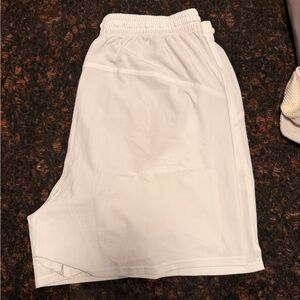 White lululemon size L high rise 5 inch shorts